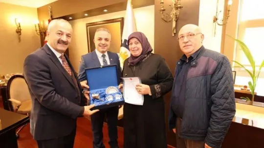 27 yıllık tapu ve mülkiyet sorununun çözüldüğü mahallede ilk tapu verildi