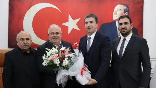 Erhan Güzel'den Üner'e nezaket ziyareti