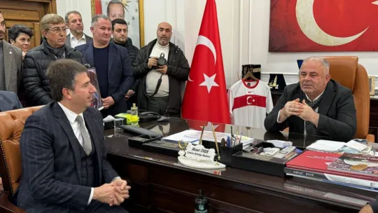 Erhan Güzel'den Üner'e nezaket ziyareti