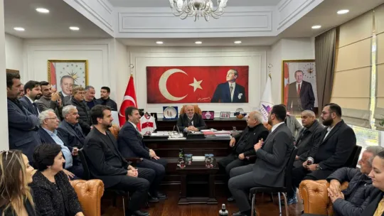 Erhan Güzel'den Üner'e nezaket ziyareti