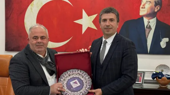 Erhan Güzel'den Üner'e nezaket ziyareti