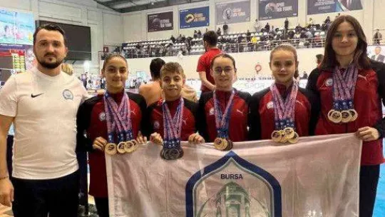 Yıldırım'ın altın kulaçlarından 14 madalya