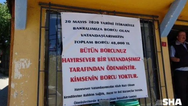 (ÖZEL) Gizemli hayırsever kadın mahallelinin 20 yıllık veresiye borcunu kapattı
