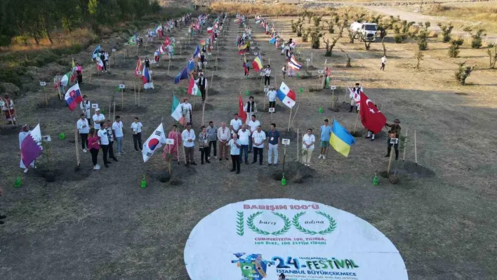 100 ülkenin gençleri dünya barışı için 100 zeytin fidanı dikti