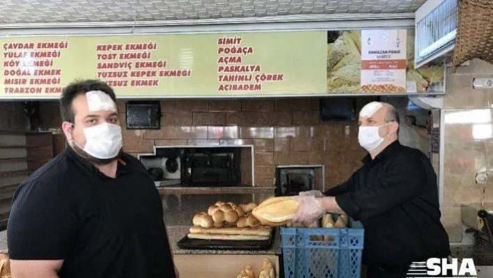 (Özel) Ramazan pidesi siparişi alan fırına sopalı bıçaklı saldırı kamerada