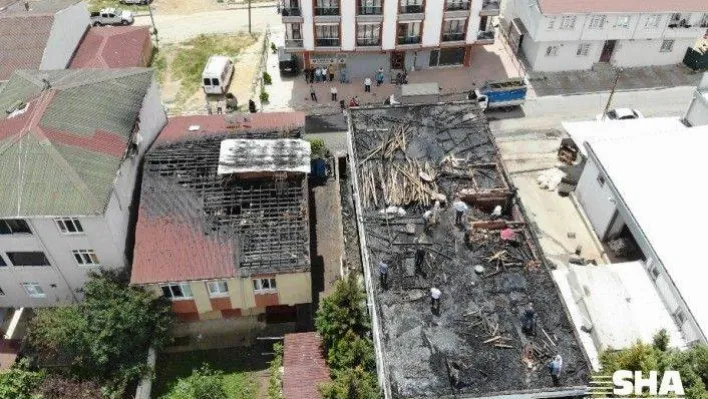 Alevlere teslim olan 3 binanın çatısında oluşan hasar havadan görüntülendi