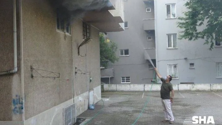 İş yerinde çıkan yangını bahçe hortumu ile söndürmeye çalıştı