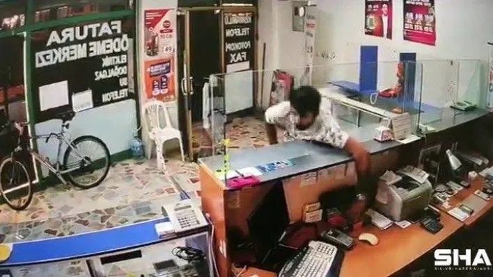 Ataşehir'de iş yerine müşteri gibi giren şahsın para çaldığı anlar kamerada