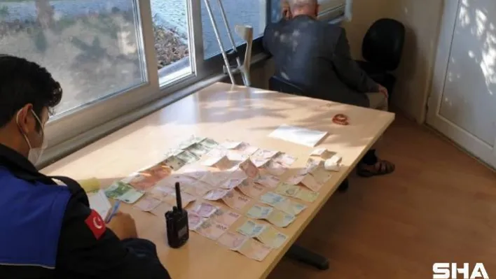 (ÖZEL) Dilencinin üstünden çıkan paralar şoke etti