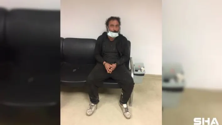 Azerbaycan ve Türk bayraklarını yere fırlatan şahıs adliyeye sevk edildi