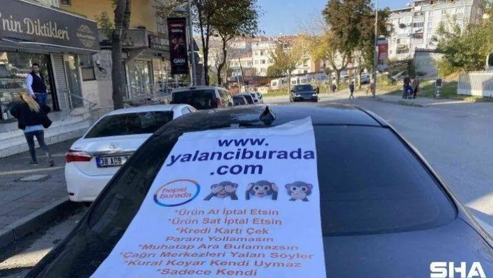 &quotAlışveriş sitesi mağdur etti&quot gerekçesiyle afiş bastırıp arabasına astı