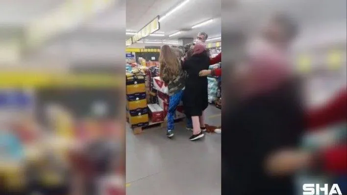 Markette kadınların maske takmama kavgası kamerada