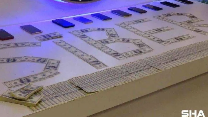 ATM'ye sahte dolar yatırıp gerçek para çeken şüphelilerden 2'si tutuklandı