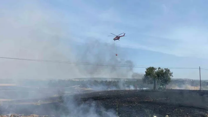 Çanakkale'de tarım alanında başlayan yangın devam ediyor