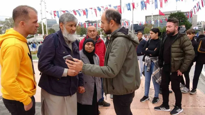 Eşinin çantasını soymaya çalışan kadını yakalayarak polise teslim etti